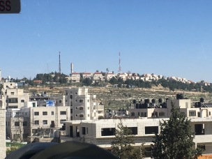 A Jewish settlement on a hill amongst the Palestinian villages of the West Bank.
